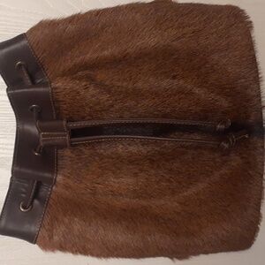 Cowhide hair handbag.